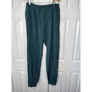Vintage Nike‎ Men's Green Drawstring Windbreaker 28x29